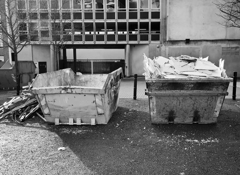 Waste collection trucks operating in Hammersmith streets