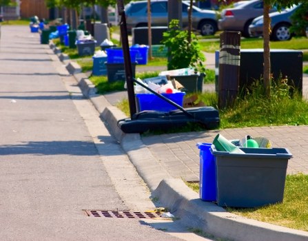 Residential waste bins ready for collection in a Hammersmith neighborhood